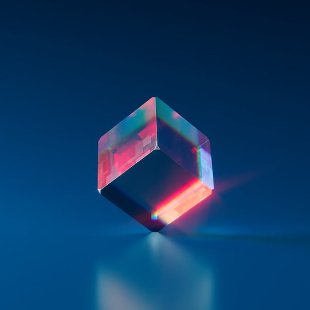 multicolor crystal cube on glass